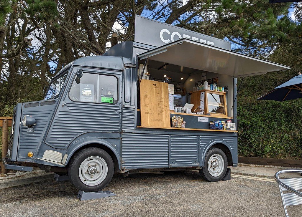 Coffee van with dimensional lettering applied to the side panel